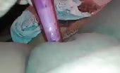 Indian aunty using a dildo to masturbate